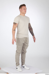 Gilbert beige t-shirt beige trousers casual dressed standing white sneakers…
